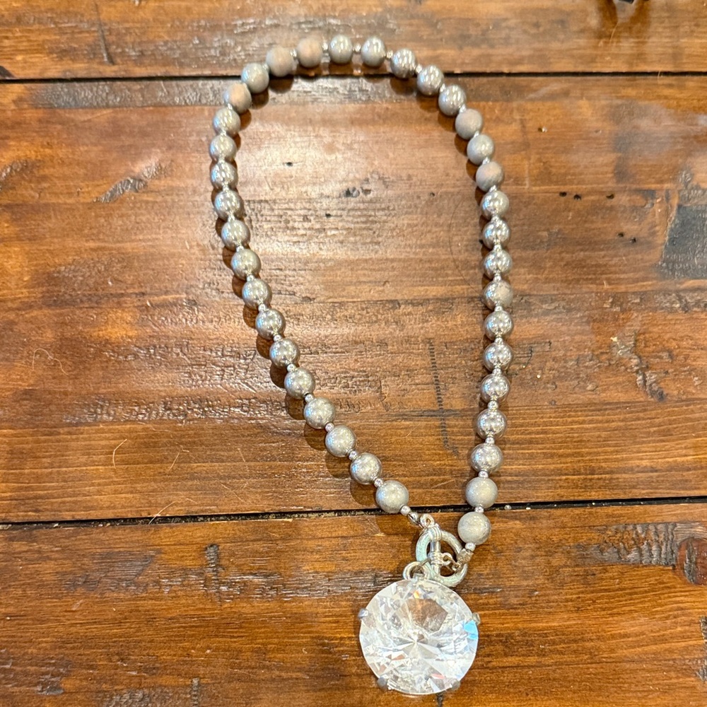 Elegant Silver Beaded Necklace with Crystal Pendant